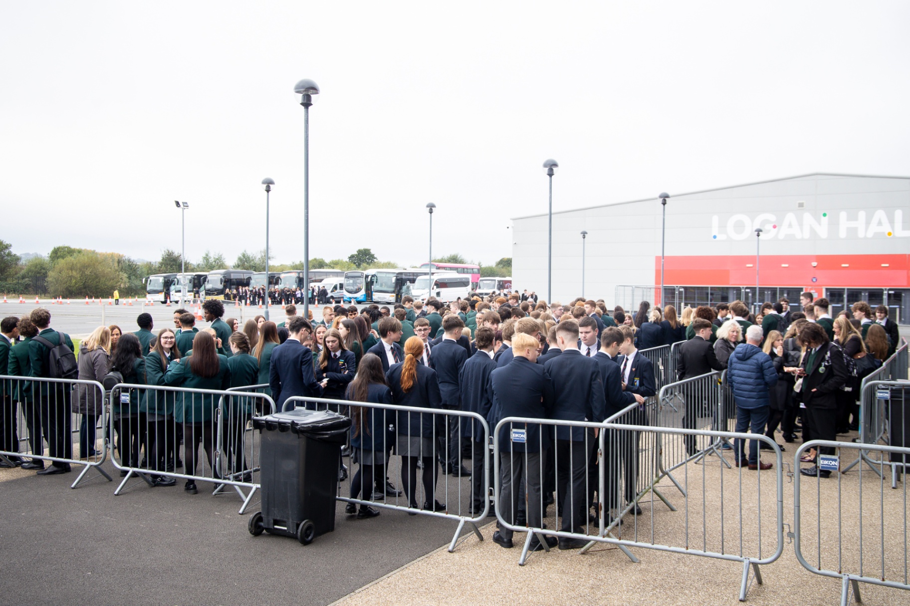 Hundreds of secondary-school pupils queuing outside the Eikon Exhibition Centre ahead of School Summit Northern Ireland, 2025.